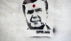 Four Activists Thrown in Prison For Picture of Yanukovych Shot in the Head. PHOTOS