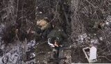 Russians lying in a cemetery