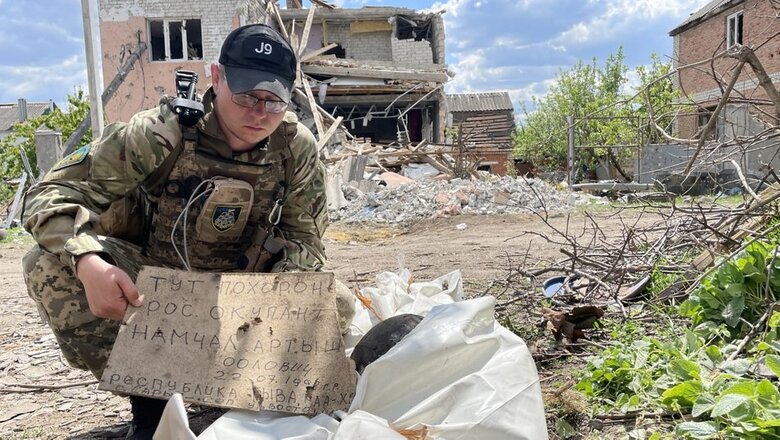 Тела российских военных, вероятно, убитых своими же, собирают в Малой Рогане под Харьковом 03
