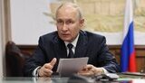 путін