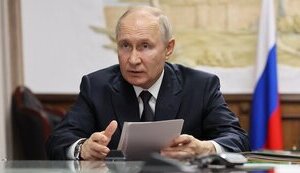 путін