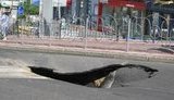 Земля уходит из под ног Попова: в центре Киева провалился асфальт. ФОТОфакт