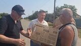 Вручение микроволновки отцу ликвидированного оккупанта