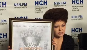 Сенатор РФ Петренко оскандалилась, "ответив" Charlie Hebdo ворованной карикатурой с Януковичем в котле: "Я подпишусь под любой картинкой с адом". ФОТО
