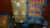 Налоговиками в Киеве из незаконного оборота изъята крупная партия сигарет и алкоголя. ФОТОрепортаж