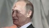 путін