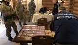 Наркоторговця затримано на Закарпатті під час спроби дати 20 тис. грн хабара співробітнику СБУ. ФОТОрепортаж