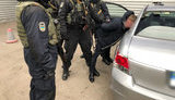 Police apprehends eight State Migration Service officials suspected of illicit enrichment, drug trafficking. PHOTOS+VIDEO