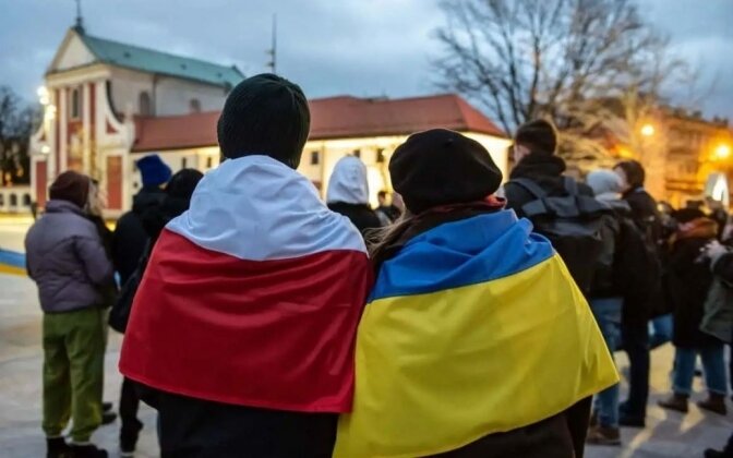 біженці,польща