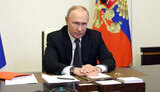 путін