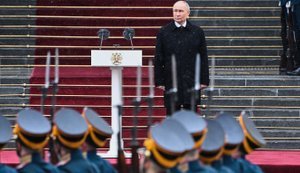 путін