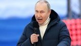 путін