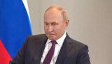 путін