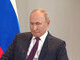 путін