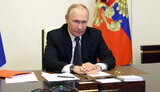путін