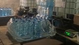 В одному з гаражів Харкова поліція виявила 12 тонн нелегального спирту. ФОТОрепортаж