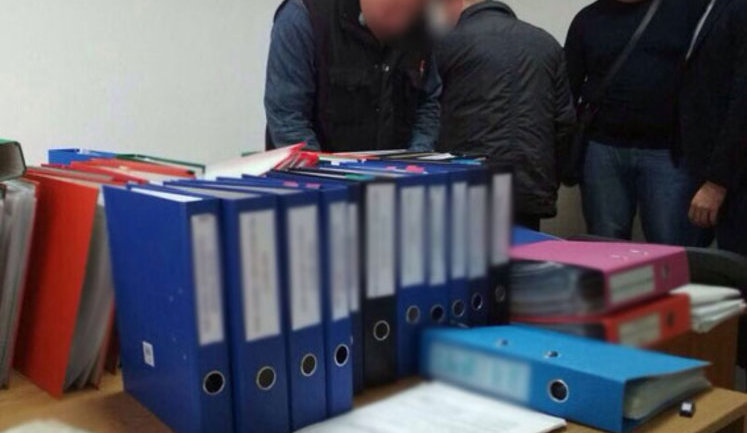Поліція і прокуратура викрили схему випуску на ринок "сміттєвих" цінних паперів на суму майже 25 млрд грн. ФОТОрепортаж