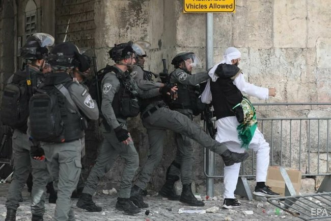 Ракетні обстріли і вуличні заворушення: кадри з Ізраїлю 34