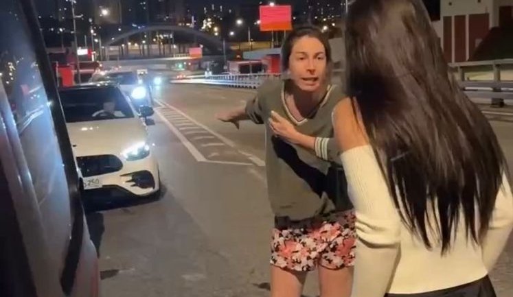 Two young women from Moscow are swearing at each other over place in queue at petrol station. VIDEO