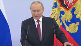 путін
