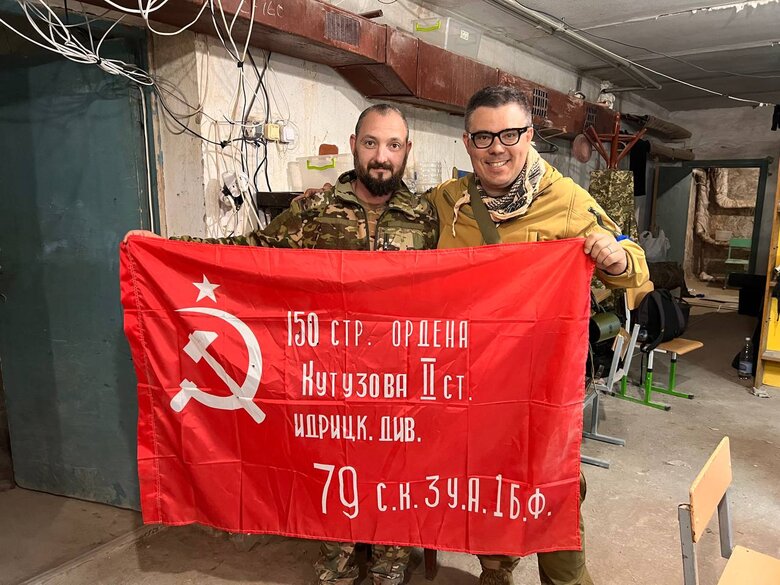 Ukrainian soldiers captured flag of 150th motorized rifle division of Russian Federation near Balaklia 01