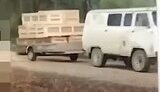 буханка везе на причепі домовини семи окупантів