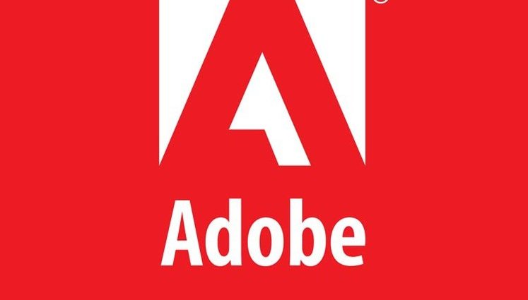 Adobe теж перекладе на українців вартість запровадженого Зеленським податку