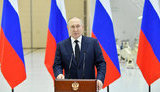 путін