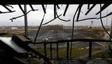 Ukraine Fighters, Surrounded at Wrecked Airport, Refuse to Give Up