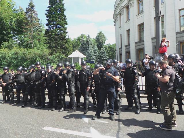 Protesters clash with police near Rada building 22