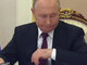 путін