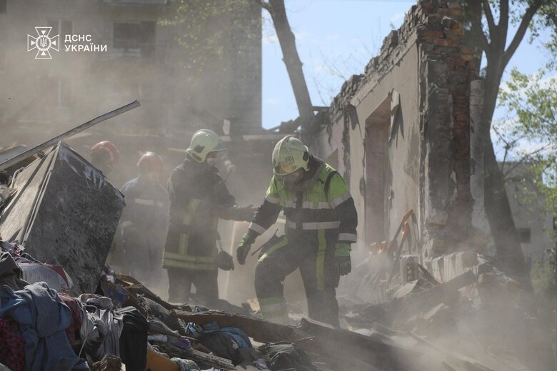 Rescuers at the site of the hit