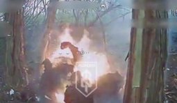 росіянин горить у переліску