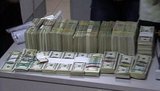 Изъятие ценностей у главы Государственного центра занятости: общая сумма $7.5 млн. ФОТО