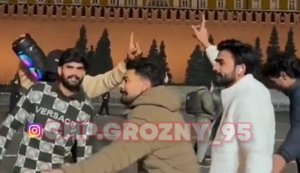 Group of Indians in Moscow dance on Red Square in front of the Kremlin. VIDEO