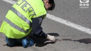 На месте покушения на Кернеса работают криминалисты. ФОТОрепортаж
