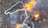 Russian soldier on fire after drone attack