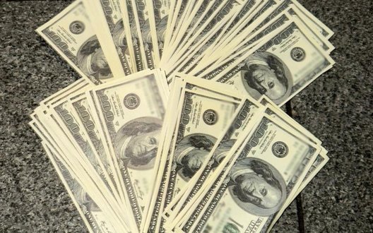 У Києві Нацполіція затримала двох чоловіків, які вимагали у дружини мобілізованого $20 тис. за звільнення з ТЦК. ФОТОрепортаж