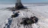 The bodies of the eliminated occupiers around the destroyed loaf