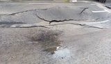 Власти Киева объяснили смытый ливнем асфальт в центре города