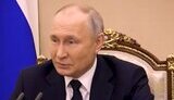 путін