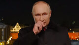 путін