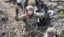 Russian with his hands up