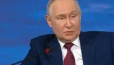 путін
