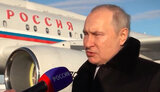 путін