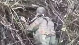 Russian man slits his wrists on battlefield