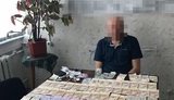Двух должностных лиц "Завода им. Малышева" в Харькове уличили в систематических взятках. ВИДЕО+ФОТОрепортаж