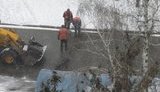 Несмотря на мокрый снег и холод, дорожные службы взялись за ямочный ремонт в Киеве. ФОТОрепортаж+ВИДЕО