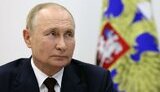 путін