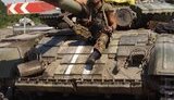 Боєць батальйону "Кривбас" Андрій Новохатько: "Скрізь лежали розбиті машини і шматки тіл. Було страшно, але нам у голову вдарив адреналін, і ми всі як один підняли голову, взяли автомати і почали відстрілюватись"